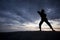 Silhouette of young boy performing a pencak silat