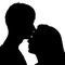 Silhouette of a young couple in love.