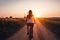 Silhouette of a young girl rides a bike, sunset. Generative AI