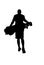 Silhouette of young golfer walking away with golf bag