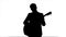 Silhouette Young man playing guitar