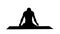 Silhouette Young man practicing yoga in lotus position.