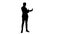 Silhouette Young man in suit taking selfies on the phone