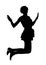 Silhouette of a young  slender  skinny girl who is having fun jumping up