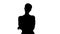 Silhouette Young strict businesswoman isolated standing waiting.