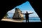 Silhouette of a young traveler man enjoying in the marvelous landscape of Cathedral cove, Coromandel Peninsula
