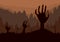 Silhouette of Zombie Hand rising out of the ground.