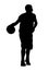 Silhouetted basketball player