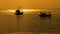 Silhouetted boats