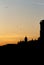 SIlhouetted Church with Seagulls Flying by in Porto