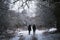 Silhouetted couple in the snow