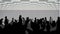 Silhouetted crowd raising hands in the air on grey background with moving grey and white checkerboar