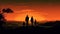 Silhouetted family takes in the stunning sunset view in the countryside