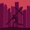 A silhouetted figure carrying a large cross runs on a ridge with a skyline