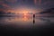 A silhouetted girl at a beach