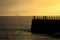 Silhouetted Pier at Sunset