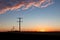 Silhouetted Telegraph Lines at Sunrise