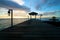Silhouetted wooden pier