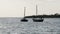 Silhouettes African Wooden Dhow Boat with Fishermen Floating by Ocean, Zanzibar