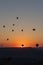 Silhouettes of air balloons in the sunset sky Goreme National Park, Turkey