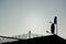 Silhouettes of antennas backlit at sunset