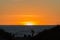 Silhouettes on the beach watching the sunset in Punta del Este, Uruguay