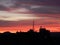 Silhouettes of buildings at dawn break during sunrise