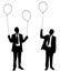 Silhouettes of businessmen holding balloons