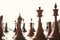 Silhouettes of chess figures on white background