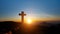 Silhouettes of Christian cross symbol on top mountain at sunrise sky background. Concept of Crucifixion Of Jesus Christ