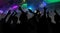 Silhouettes of concert crowd with hands raised at a music disco