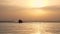 Silhouettes, couple in love, man and woman, hug and kiss, having fun, relaxing in water of outdoor infinity pool with