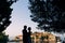 Silhouettes of couples near Sveti Stefan