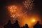 Silhouettes of crowds of people who are watching the fireworks. Celebrate the holiday in the square. great fun.