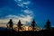 Silhouettes of cyclist on beautiful evening sky background.