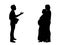 Silhouettes of doctor and young couple expecting baby