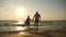 Silhouettes father and daughter play on the beach at sunset. Concept of friendly family, travel, lifestyle.