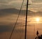 Silhouettes fishing boats at sea in sunset