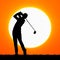 Silhouettes golfers with sunset