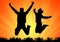 Silhouettes of jumping people