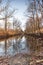 Silhouettes landscape view sunset Water reflection, a canal in a large nature reserve, Fochteloerveen, The Netherlands