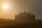 Silhouettes of majestic mosque on desert