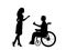 Silhouettes of man in wheelchair makes an offer gives wedding ring to woman