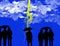 Silhouettes of many people holding opened umbrellas against cloudy blue sky and yellow lightning.