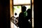 Silhouettes of the newlyweds in the cafe