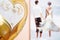 Silhouettes of newlyweds on honeymoon and gold festive balloon