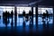 Silhouettes of passengers in an asian airport