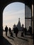 Silhouettes of people on the background of the gate entrance to the red square Moscow historical landmark symbol
