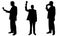 Silhouettes of people toasting