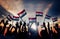 Silhouettes of People Waving the Flag of Iraq